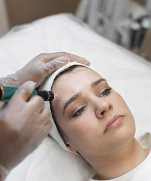 person-getting-micro-needling-beauty-treatment